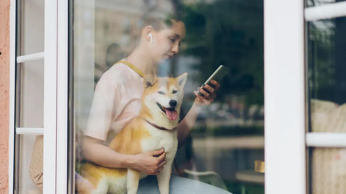 Dog owner at home