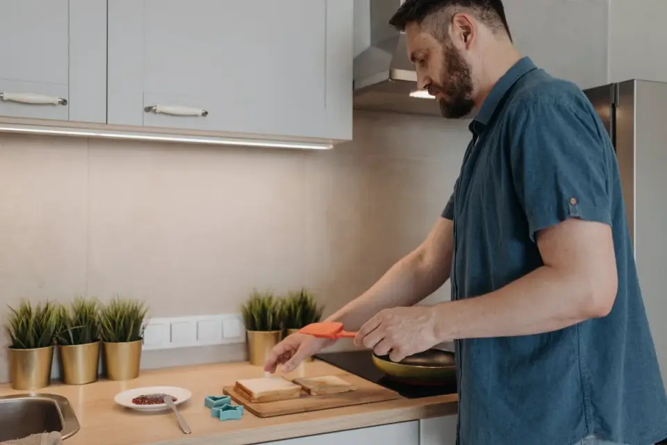 Dog owner preparing a meal