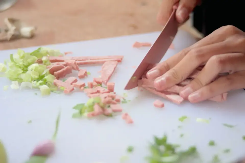 Dog owner preparing a meal