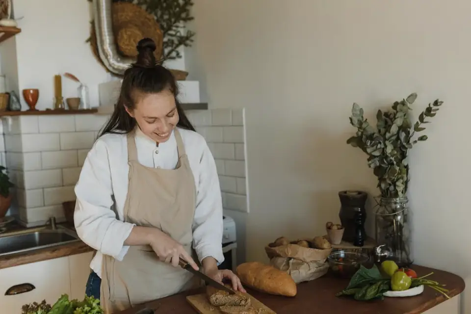 Dog owner preparing a meal