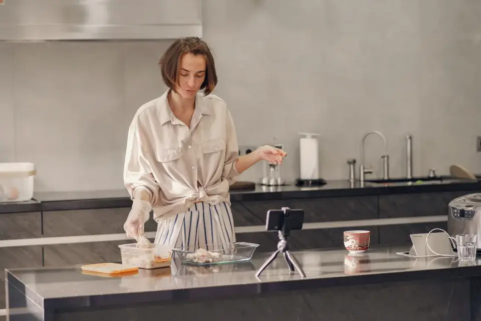 Dog owner preparing dog food kitchen
