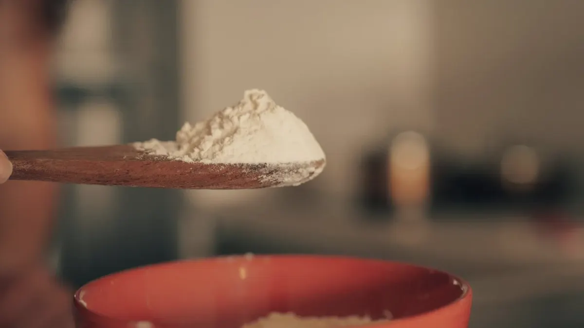 Small scoops of powdered and freeze-dried dog supplement side by side on a counter